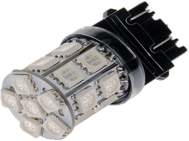Dorman Back Up Light Bulb,Center High Mount Stop Light Bulb,Tail Light Bulb P/N:3157R-SMD Fits: BMW 528i, BMW 540i, Buick Lesabre, Buick Regal, Buick Rendezvous, Cadillac Cts, Cadillac Deville, Cadillac Escalade, Cadillac Seville - Image 1
