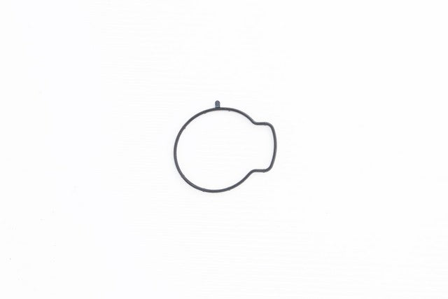 Safety Auto Parts Corp Fuel Injection Throttle Body Mounting Gasket P/N:TH21-131 Fits: Hyundai Santa Fe, Hyundai Santa Fe Sport, Hyundai Sonata, Hyundai Tucson, Kia Forte, Kia Forte Koup, Kia Forte5, Kia Magentis, Kia Optima, Kia Rondo - Image 1